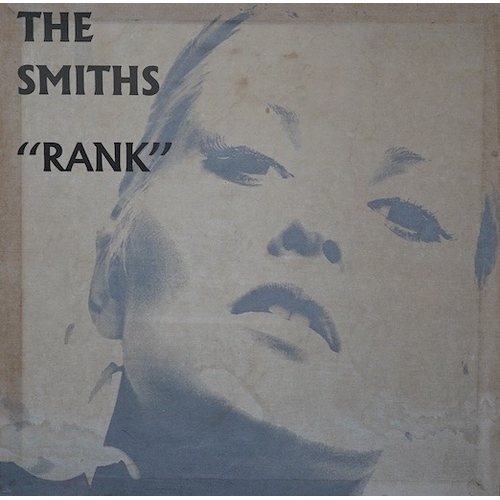 306 - The Smiths interest; a 1980s printed cloth advertising banner mounted on wood stretchers, promoting ... 