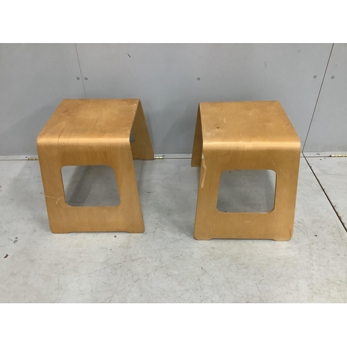 31 - A pair of Swedish wooden stools by USA Norinder for IKEA, c.1990, each width 48cm, depth 35cm, heigh... 