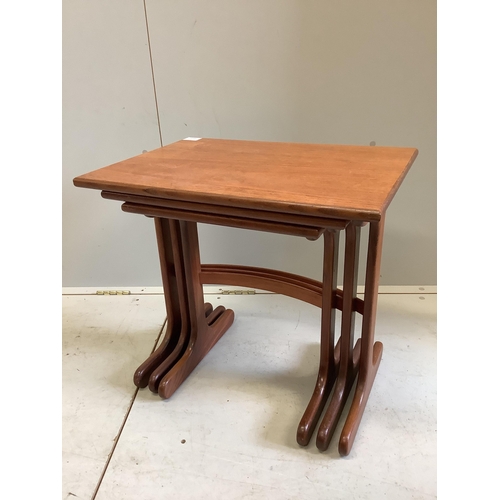 34 - A nest of three G-Plan teak tables, width 56cm, depth 40cm, height 52cm. Condition - fair