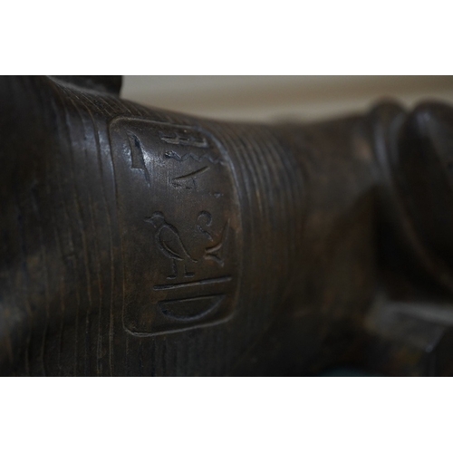 361 - A pair of bronze models of Sphinxes, raised on green serpentine marble bases, 32cm long. Condition -... 