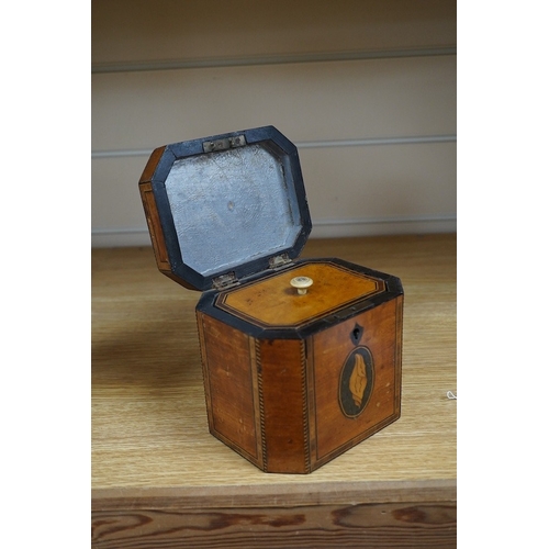 363 - A George III Sheraton period octagonal West Indian satinwood and marquetry tea caddy, 12cm high. Con... 