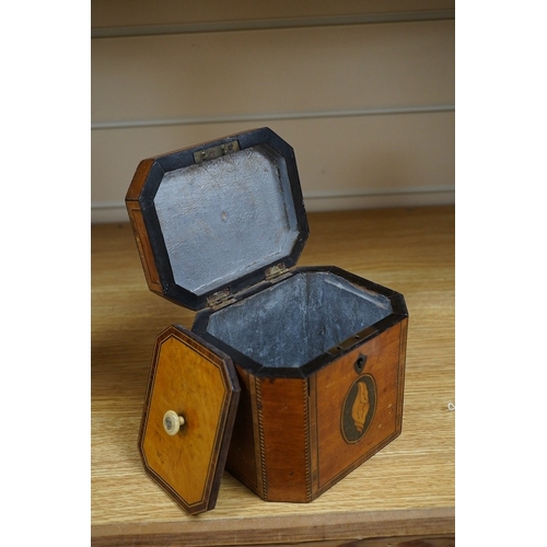 363 - A George III Sheraton period octagonal West Indian satinwood and marquetry tea caddy, 12cm high. Con... 