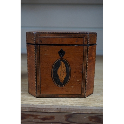 363 - A George III Sheraton period octagonal West Indian satinwood and marquetry tea caddy, 12cm high. Con... 