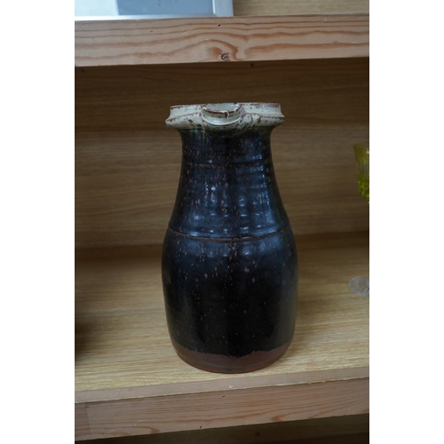 364 - Richard Batterham (1936-2021), a tall stoneware black glazed jug, with a cream rim. 28cm high. Condi... 