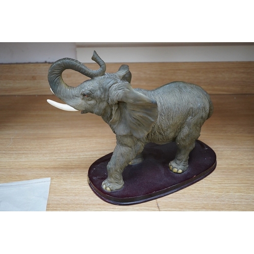 368 - Juliana Collection, a resin sculpture of an elephant, 40cm wide. Condition - good