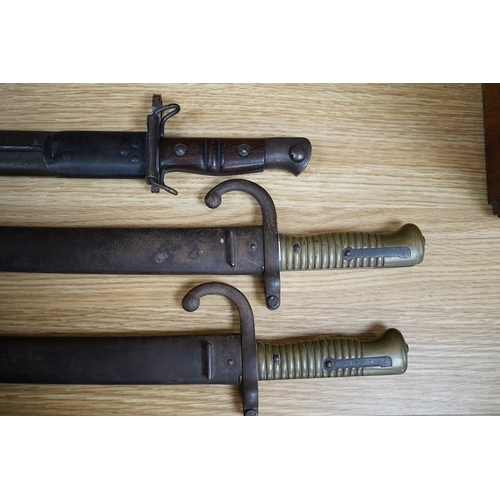 371 - Two 19th century French bayonets and an American example, largest 71cm. Condition - fair