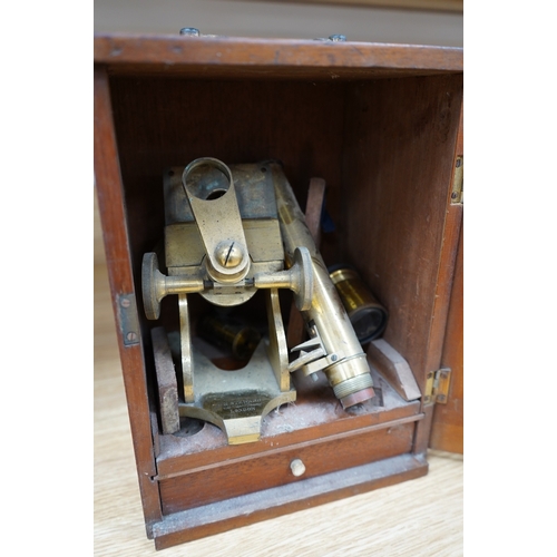 372 - A mahogany cased late 19th century brass microscope by J.H. Steward, 456 West Strand London, with a ... 