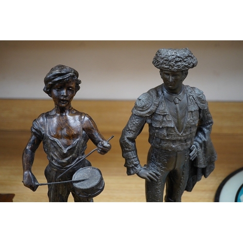 376 - Two spelter figures, including a matador raised on turned wood base, 38cm high. Condition - fair... 