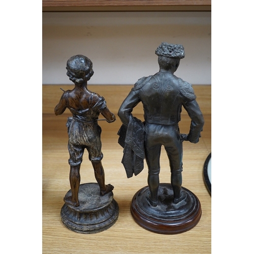 376 - Two spelter figures, including a matador raised on turned wood base, 38cm high. Condition - fair... 