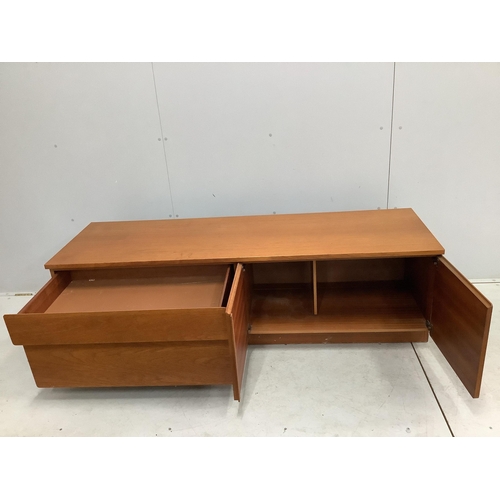 38 - A mid century McIntosh teak extending dining table, width 150cm, depth 82cm, height 74cm together wi... 