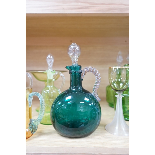 396 - Ten glass items; a pair of green hock glasses, six liqueur decanters, a pedestal table centre and a ... 