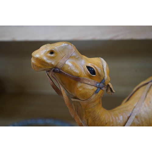 415 - A Liberty style finely modelled brown leather camel in the manner of Omersa, 49cm high. Condition - ... 