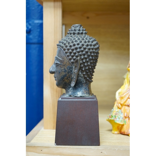 416 - A Thai bronze head of Buddha, probably 18th century, 25cm high. Condition - good