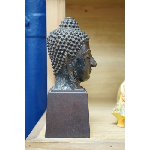 416 - A Thai bronze head of Buddha, probably 18th century, 25cm high. Condition - good