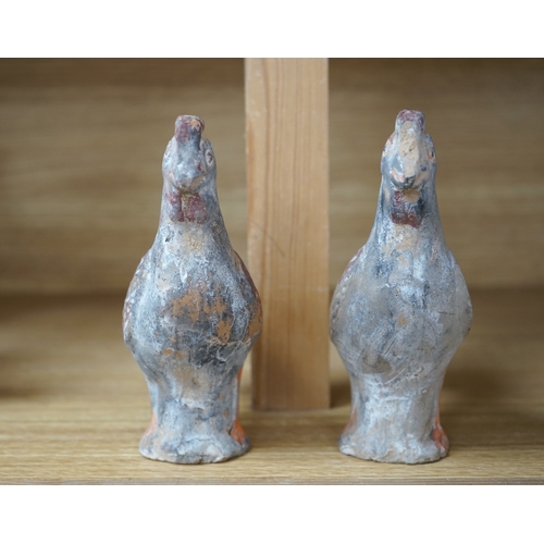 418 - A pair of Chinese pottery figures of cockerels, Han Dynasty or later, height 17cm. Condition - fair... 