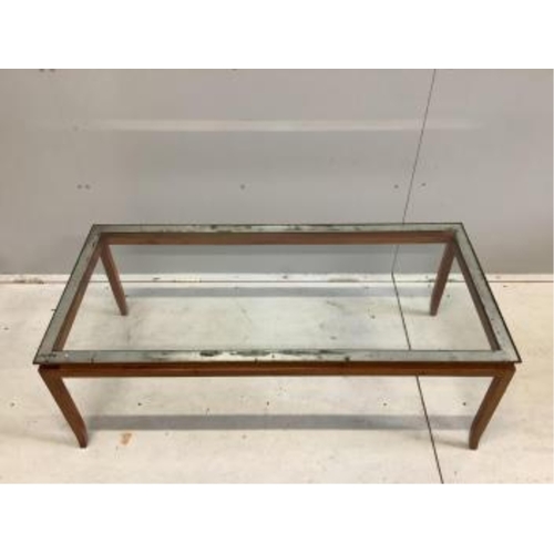 42 - A mid century teak glass top coffee table, width 125cm, depth 58cm, height 45cm. Condition - fair... 