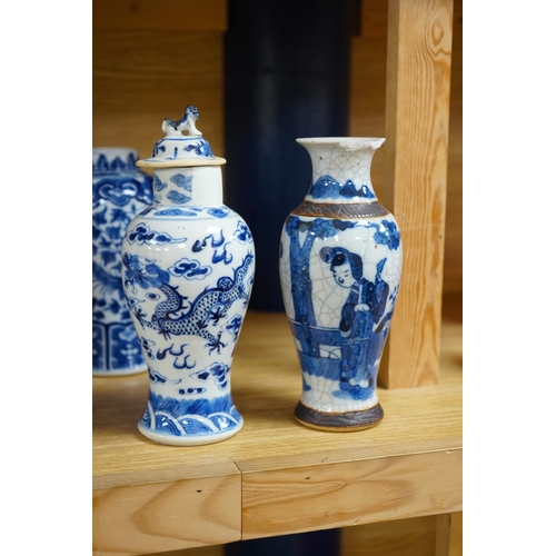 423 - A collection of 19th and 20th century Chinese blue and white vases and tea bowls, largest 21cm high.... 