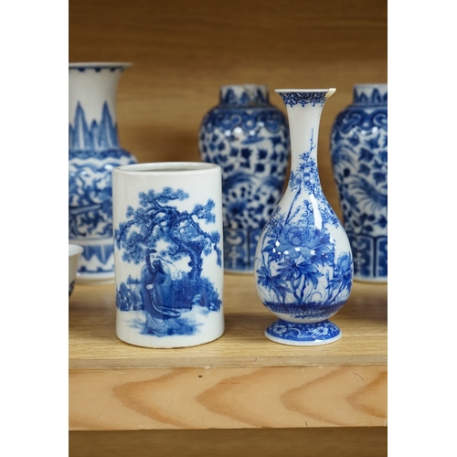 423 - A collection of 19th and 20th century Chinese blue and white vases and tea bowls, largest 21cm high.... 