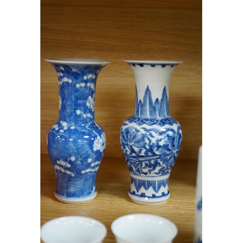 423 - A collection of 19th and 20th century Chinese blue and white vases and tea bowls, largest 21cm high.... 