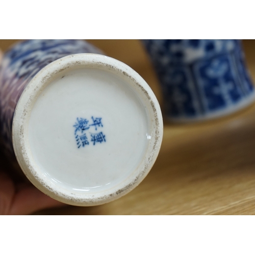 423 - A collection of 19th and 20th century Chinese blue and white vases and tea bowls, largest 21cm high.... 