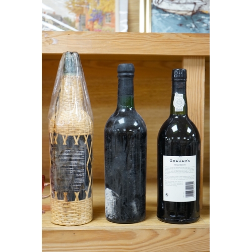 425 - One bottle of Grahams 1963 port, label lacking, one bottle of Grahams Malvedos vintage port 1987 an... 