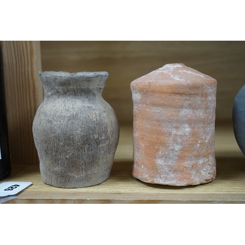 426 - Four Chinese archaic pottery vessels, Neolithic to Han Dynasty, largest 16cm high. Condition - fair,... 