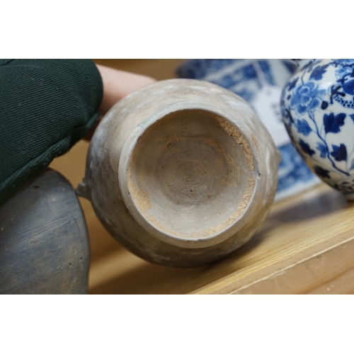 426 - Four Chinese archaic pottery vessels, Neolithic to Han Dynasty, largest 16cm high. Condition - fair,... 