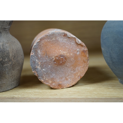 426 - Four Chinese archaic pottery vessels, Neolithic to Han Dynasty, largest 16cm high. Condition - fair,... 