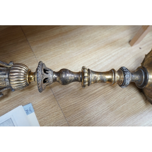 434 - A brass ecclesiastical part chandelier column, 105cm in length. Condition - fair