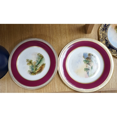 439 - A collection of English porcelain plates, highlights include a Royal Doulton fruit painted cabinet p... 