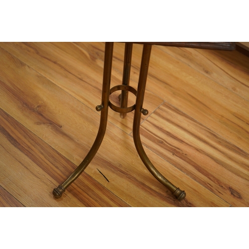 440 - An Edwardian oak and brass Canterbury stand, 76cm. Condition - fair to good.