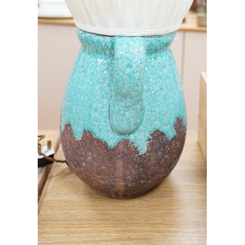 451 - A turquoise lava ceramic table lamp with fabric shade, wired, 65cm high to top of shade. Condition -... 