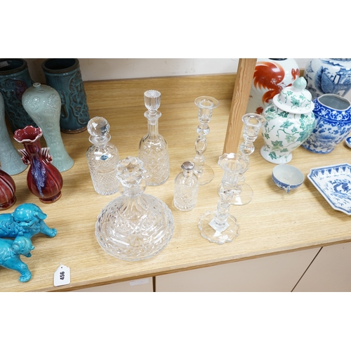 456 - A cut glass ships decanter, two others and three various cut glass candle sticks, tallest decanter ... 