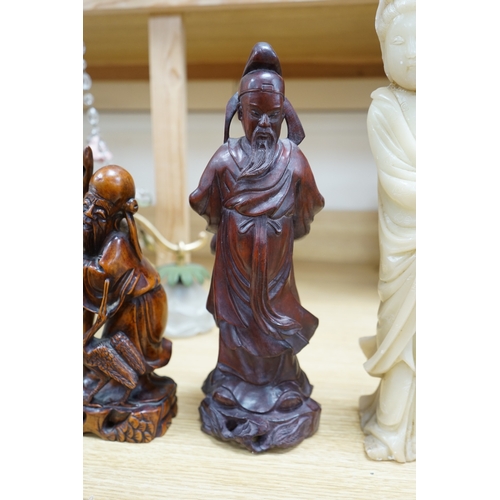 464 - Two Chinese hardwood carved figures and a soapstone figure of Guanyin, largest 37cm high. Condition ... 