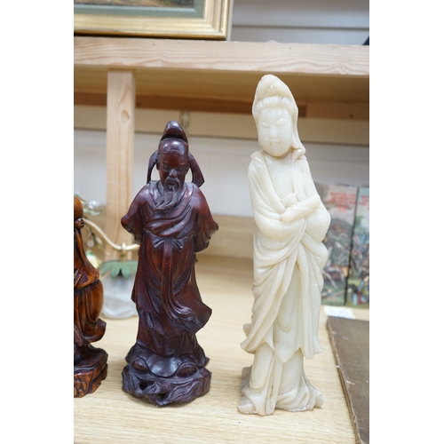 464 - Two Chinese hardwood carved figures and a soapstone figure of Guanyin, largest 37cm high. Condition ... 