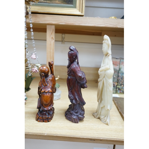 464 - Two Chinese hardwood carved figures and a soapstone figure of Guanyin, largest 37cm high. Condition ... 