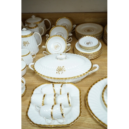 466 - An extensive Minton gold rose dinner and tea service. Condition - fair to good, tureen cracked... 