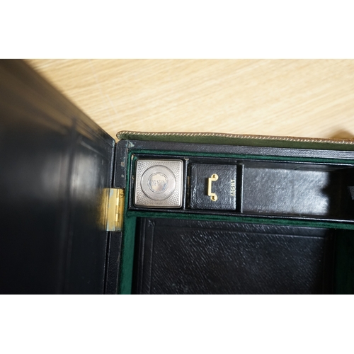 471 - Wells & Lambert, London, a travelling writing box and outer leather case, with Bramah lock and keys,... 