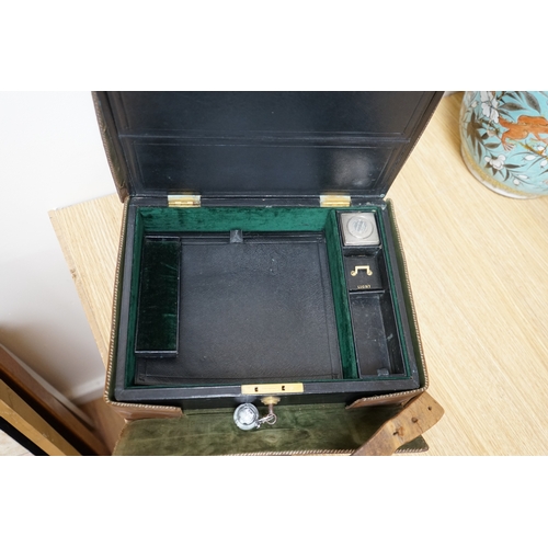 471 - Wells & Lambert, London, a travelling writing box and outer leather case, with Bramah lock and keys,... 