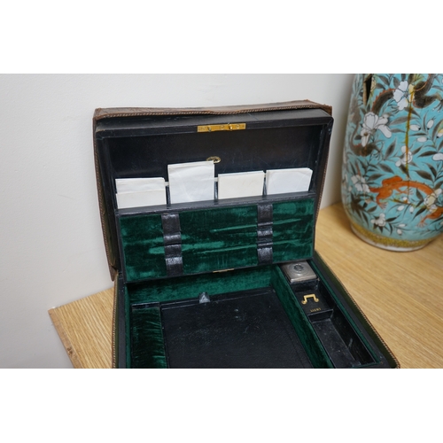 471 - Wells & Lambert, London, a travelling writing box and outer leather case, with Bramah lock and keys,... 