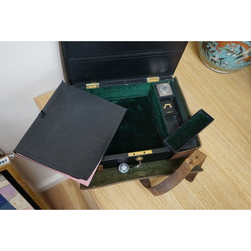 471 - Wells & Lambert, London, a travelling writing box and outer leather case, with Bramah lock and keys,... 