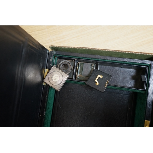 471 - Wells & Lambert, London, a travelling writing box and outer leather case, with Bramah lock and keys,... 