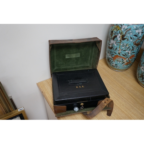 471 - Wells & Lambert, London, a travelling writing box and outer leather case, with Bramah lock and keys,... 