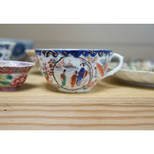 473 - A quantity of Chinese and Japanese porcelain to include blue and white bowls, famille rose tea bowls... 