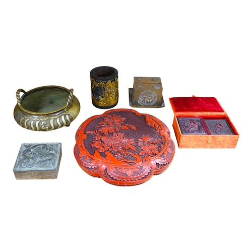 486 - A collection of Chinese and Japanese items to include a lacquered box, a bronze tripod censer, a whi... 