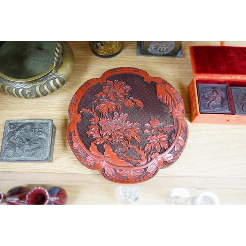 486 - A collection of Chinese and Japanese items to include a lacquered box, a bronze tripod censer, a whi... 