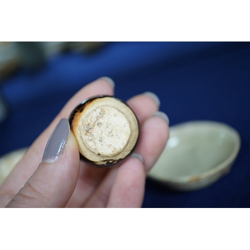 489 - A group of Thai or Annamese miniature pottery vessels and a small blue and white vase, vase 9.5cm hi... 