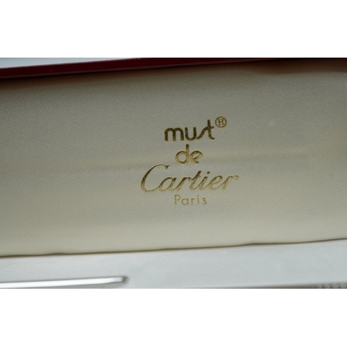 494 - A Cartier pen, 14cm long, boxed. Condition - good