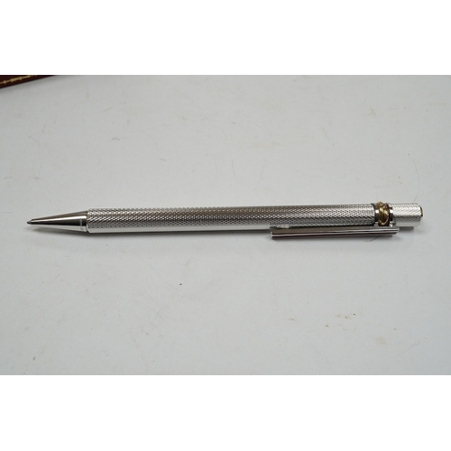 494 - A Cartier pen, 14cm long, boxed. Condition - good