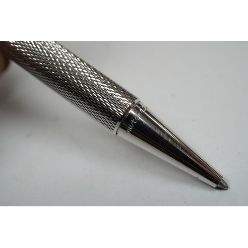 494 - A Cartier pen, 14cm long, boxed. Condition - good